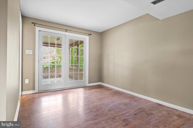 128 Pinion Pl, Bear, DE 19701 - unfurnished room featuring baseboards, wood finished floors, and visible vents