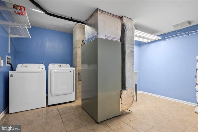 128 Pinion Pl, Bear, DE 19701 - clothes washing area featuring baseboards, tile patterned flooring, laundry area, and independent washer and dryer