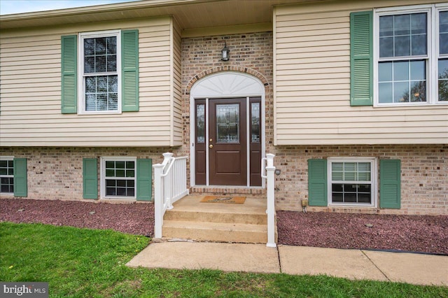 128 Pinion Pl, Bear, DE 19701 - property entrance featuring brick siding