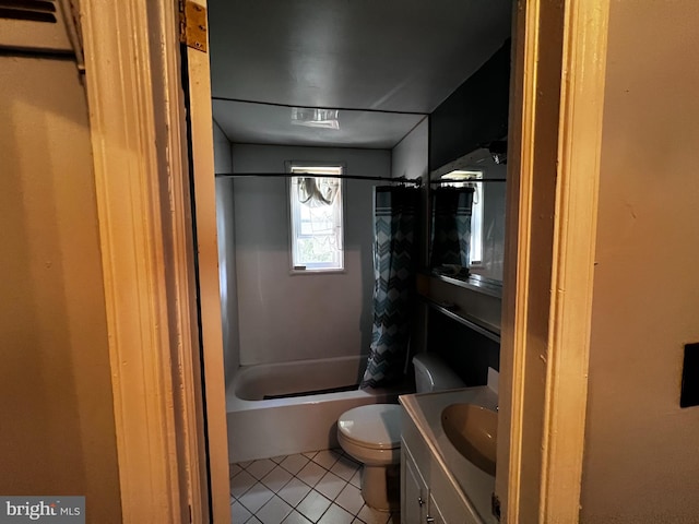 bathroom with vanity, tile patterned floors, bathing tub / shower combination, and toilet