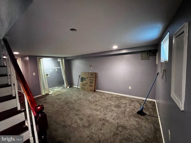 below grade area with recessed lighting, baseboards, carpet flooring, and stairs
