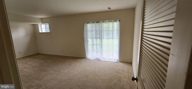 335 Paradee Dr, Dover, DE 19904 - carpeted empty room featuring baseboards