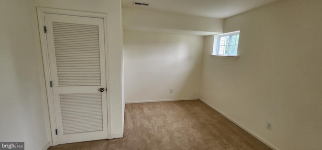335 Paradee Dr, Dover, DE 19904 - unfurnished bedroom with carpet floors and baseboards
