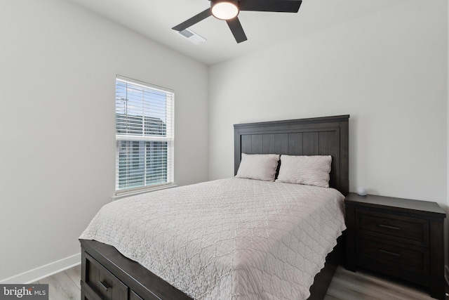 7828 Yona Ct, Glen Burnie, MD 21060 - bedroom with light wood finished floors, baseboards, and ceiling fan