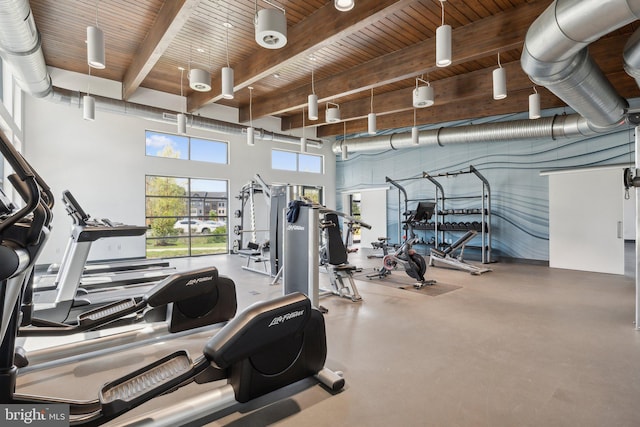 7828 Yona Ct, Glen Burnie, MD 21060 - gym featuring beamed ceiling, a towering ceiling, and wood ceiling