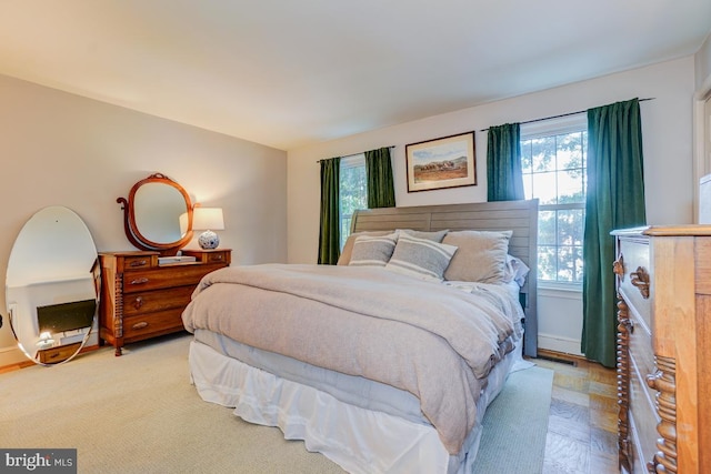 3275 Sutton Pl NW Unit C, Washington, DC 20016 - bedroom featuring multiple windows and baseboards