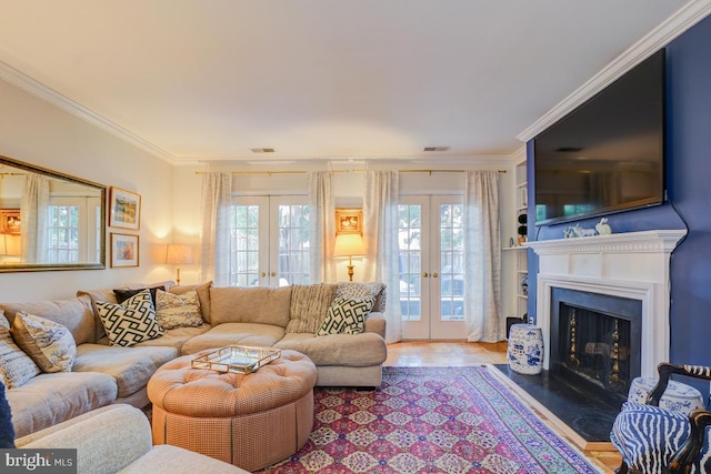 3275 Sutton Pl NW Unit C, Washington, DC 20016 - living room featuring a fireplace with flush hearth, wood finished floors, french doors, and crown molding