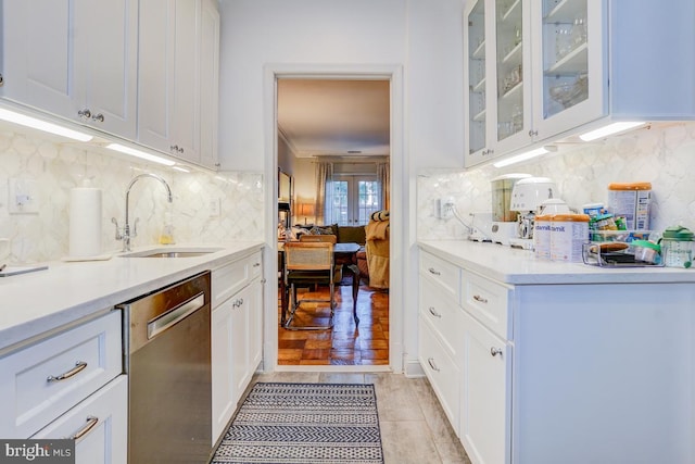 3275 Sutton Pl NW Unit C, Washington, DC 20016 - bar with stainless steel dishwasher, a sink, and tasteful backsplash