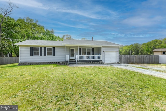 ranch-style house featuring fence, a porch, dirt driveway, and an attached garage