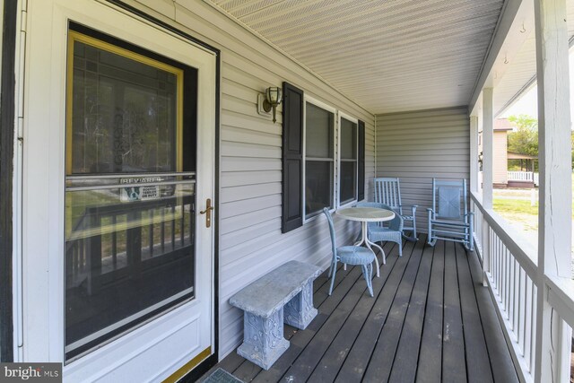 deck featuring covered porch
