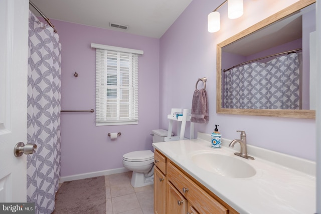 full bathroom featuring tile patterned floors, vanity, baseboards, toilet, and visible vents