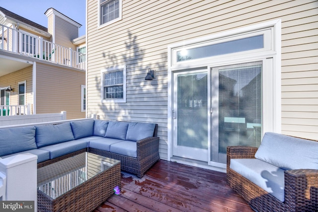 wooden deck featuring an outdoor living space