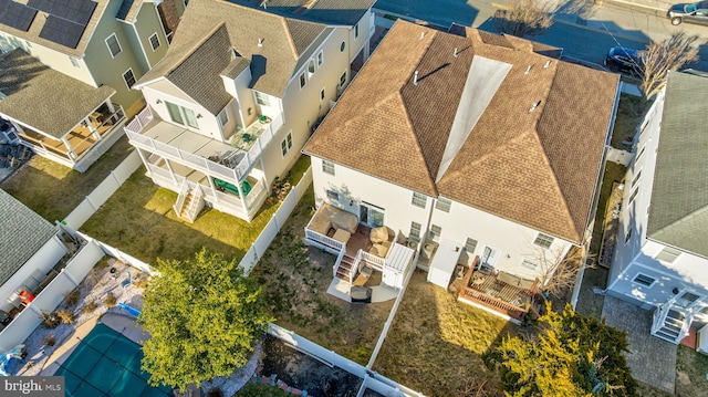 birds eye view of property with a residential view