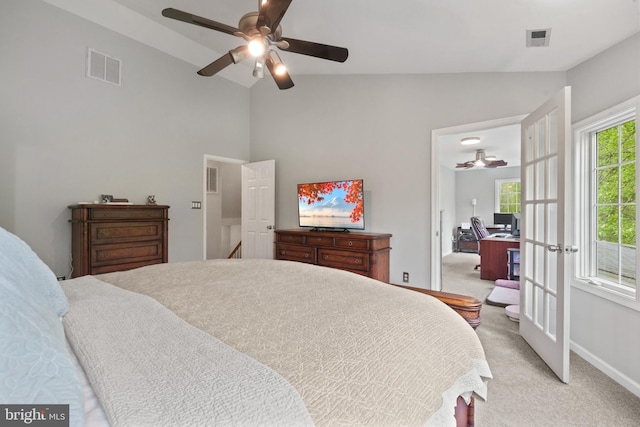 bedroom featuring baseboards, visible vents, ceiling fan, and light colored carpet