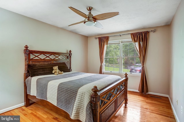 4985 Tall Oaks Dr, Monrovia, MD 21770 - bedroom with light wood-style flooring, baseboards, a ceiling fan, and visible vents