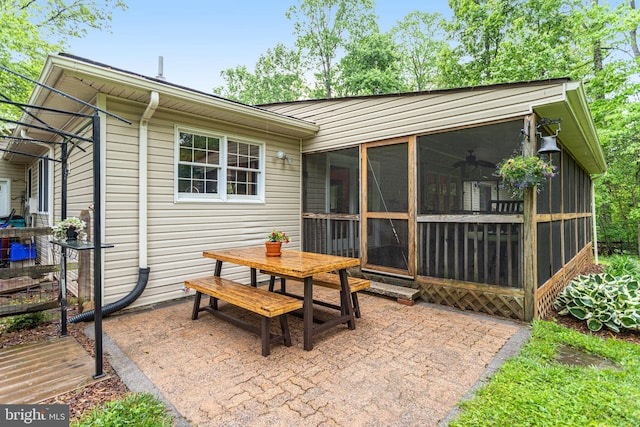 4985 Tall Oaks Dr, Monrovia, MD 21770 - view of patio with a sunroom and outdoor dining area