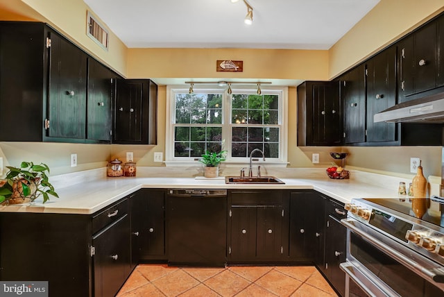 4985 Tall Oaks Dr, Monrovia, MD 21770 - kitchen featuring under cabinet range hood, dishwasher, range with two ovens, dark cabinets, and a sink