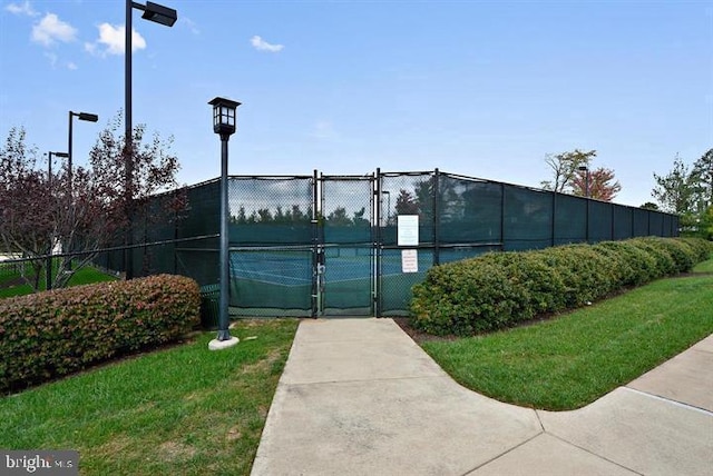 8507 Young Rivers Ct Unit 22, Laurel, MD 20723 - view of tennis court with a gate