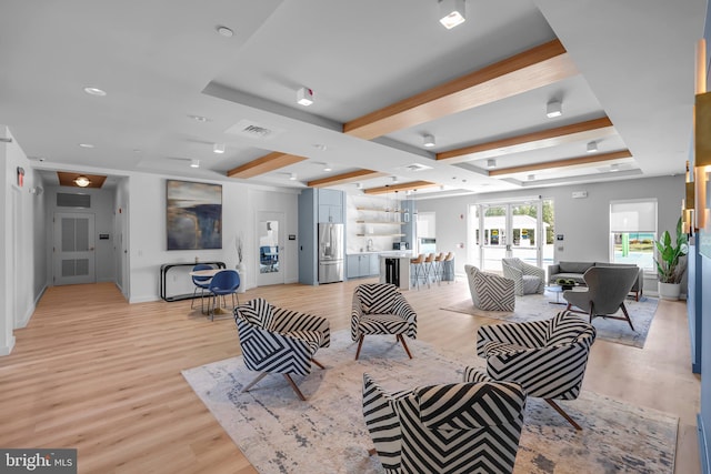 8507 Young Rivers Ct Unit 22, Laurel, MD 20723 - living area featuring light wood-type flooring, baseboards, and beam ceiling