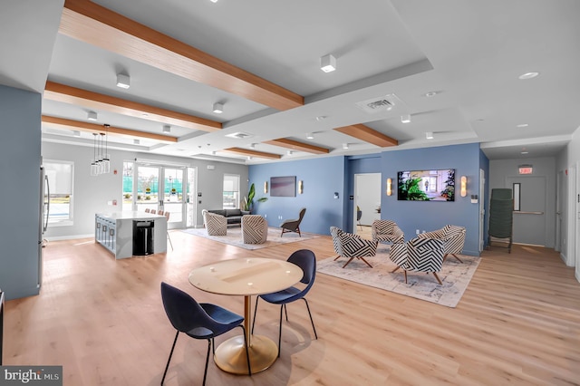 8507 Young Rivers Ct Unit 22, Laurel, MD 20723 - dining space featuring light wood-type flooring, beam ceiling, and baseboards