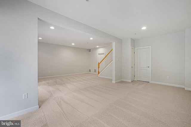 8507 Young Rivers Ct Unit 22, Laurel, MD 20723 - finished below grade area with stairway, light colored carpet, recessed lighting, and baseboards