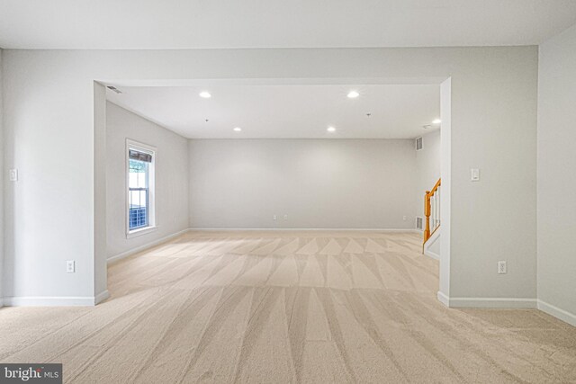 8507 Young Rivers Ct Unit 22, Laurel, MD 20723 - spare room featuring light carpet, recessed lighting, stairway, and baseboards