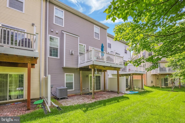 8507 Young Rivers Ct Unit 22, Laurel, MD 20723 - rear view of house with cooling unit and a yard