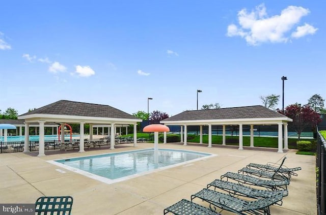 8507 Young Rivers Ct Unit 22, Laurel, MD 20723 - community pool with a gazebo, a patio area, and an outbuilding