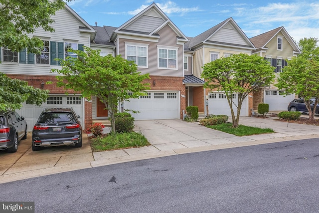 8507 Young Rivers Ct Unit 22, Laurel, MD 20723 - multi unit property with concrete driveway, a garage, and brick siding