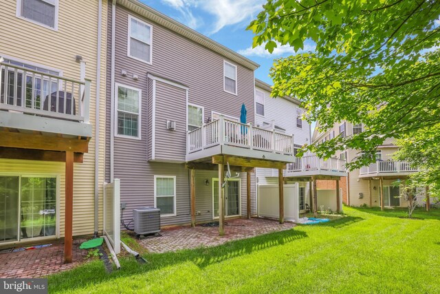 8507 Young Rivers Ct Unit 22, Laurel, MD 20723 - rear view of house with cooling unit and a yard