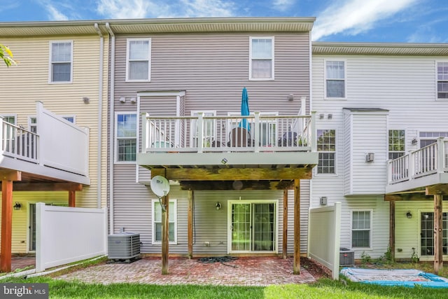 8507 Young Rivers Ct Unit 22, Laurel, MD 20723 - back of house with central AC and a patio
