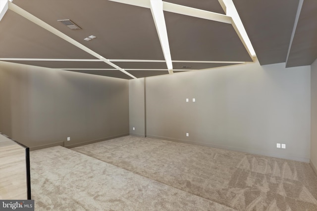interior space featuring carpet, visible vents, and baseboards