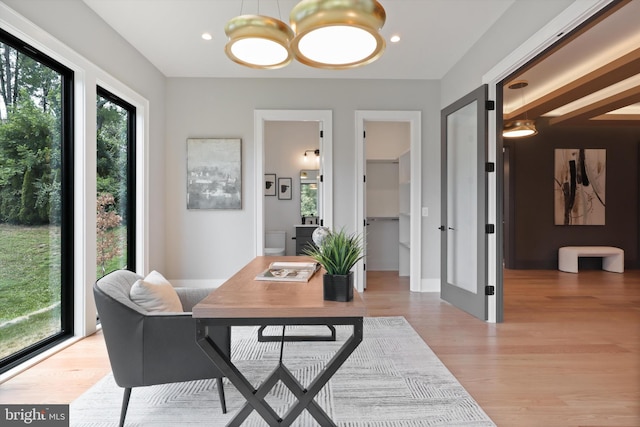 office featuring light wood finished floors and recessed lighting