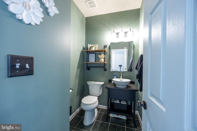 350 Rotterham Dr, Hedgesville, WV 25427 - half bath featuring visible vents, an inviting chandelier, toilet, tile patterned floors, and vanity