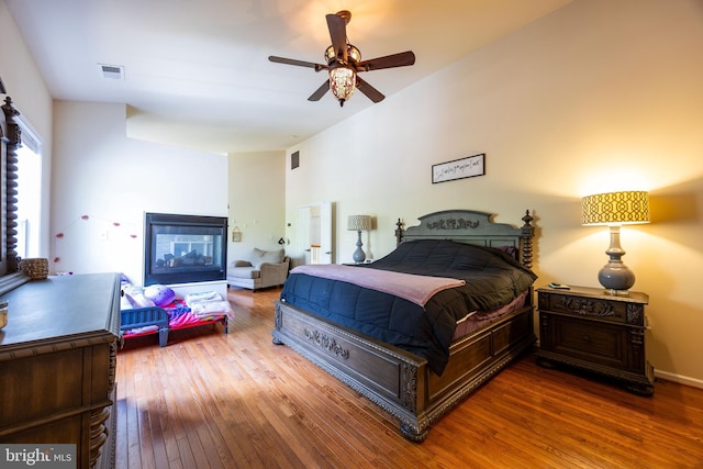 350 Rotterham Dr, Hedgesville, WV 25427 - bedroom featuring visible vents, hardwood / wood-style floors, and a ceiling fan