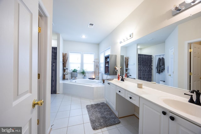 350 Rotterham Dr, Hedgesville, WV 25427 - bathroom with visible vents, a bath, tile patterned flooring, and a sink