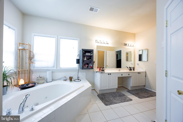 350 Rotterham Dr, Hedgesville, WV 25427 - full bathroom featuring tile patterned floors, visible vents, a tub with jets, and double vanity