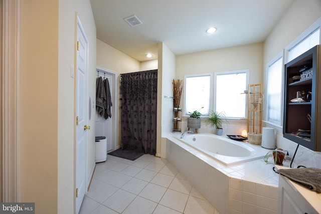 350 Rotterham Dr, Hedgesville, WV 25427 - full bathroom featuring a garden tub, visible vents, a wealth of natural light, and tile patterned floors