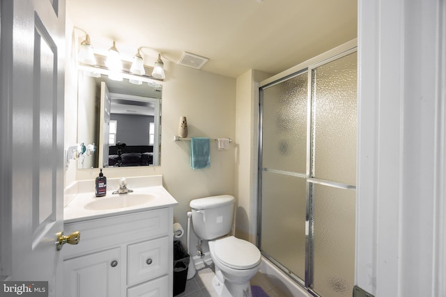 350 Rotterham Dr, Hedgesville, WV 25427 - full bathroom with visible vents, a stall shower, toilet, vanity, and ensuite bath