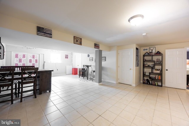 350 Rotterham Dr, Hedgesville, WV 25427 - interior space with light tile patterned flooring, a bar, and baseboards