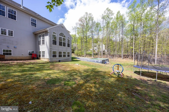 350 Rotterham Dr, Hedgesville, WV 25427 - view of yard with a trampoline