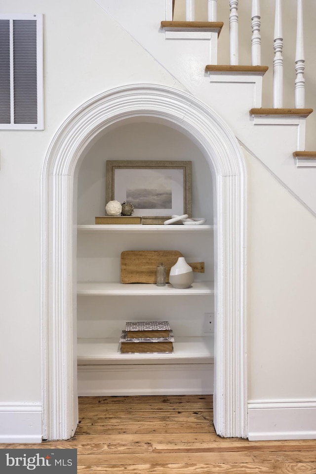 details featuring wood finished floors and visible vents
