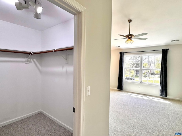 276 Rustling Oaks Way, Ruckersville, VA 22968 - walk in closet with a ceiling fan, visible vents, and carpet