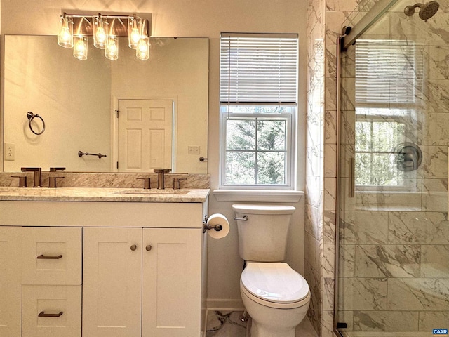 276 Rustling Oaks Way, Ruckersville, VA 22968 - full bathroom featuring toilet, a sink, double vanity, and a stall shower