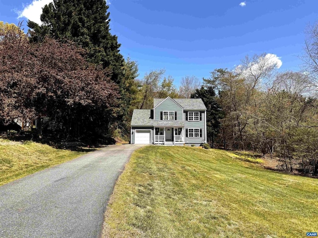 276 Rustling Oaks Way, Ruckersville, VA 22968 - view of front facade featuring a front lawn, driveway, a porch, and a garage