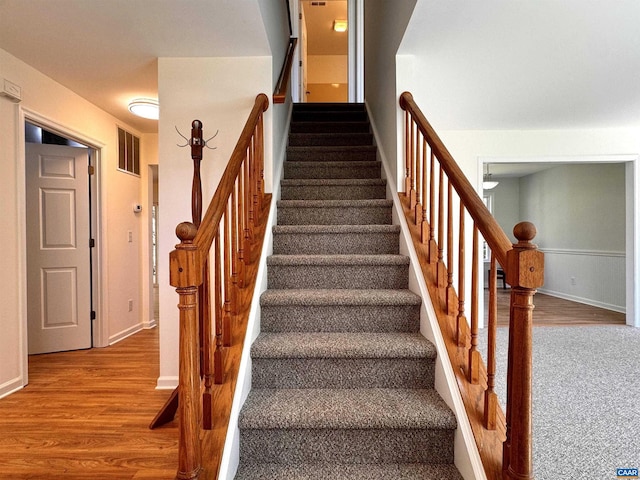 276 Rustling Oaks Way, Ruckersville, VA 22968 - stairway with baseboards, wood finished floors, and visible vents