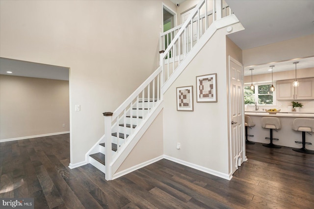 4 Brian Daniel Ct, Reisterstown, MD 21136 - staircase featuring wood finished floors and a high ceiling