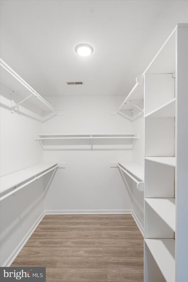 4 Brian Daniel Ct, Reisterstown, MD 21136 - walk in closet featuring wood finished floors