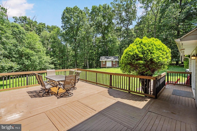 4 Brian Daniel Ct, Reisterstown, MD 21136 - wooden terrace with outdoor dining area, a lawn, and a shed