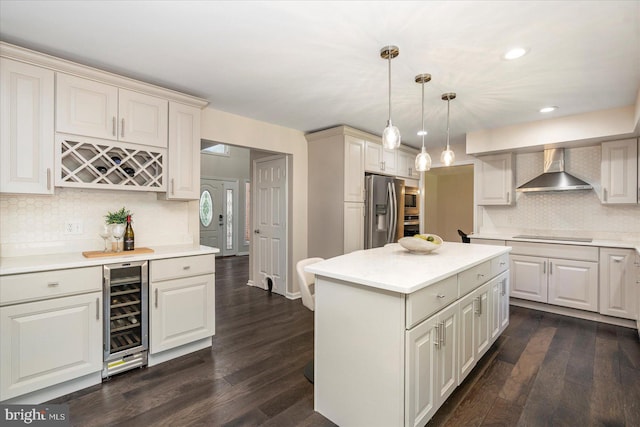 4 Brian Daniel Ct, Reisterstown, MD 21136 - kitchen featuring wall chimney range hood, wine cooler, stainless steel appliances, decorative backsplash, and dark wood finished floors
